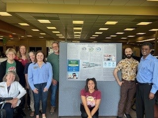 Brianna Bolton, a Dyersburg State Community College (DSCC) student, proudly presents her honors capstone project, “Literacy and Liberation: Confronting the Literacy Crisis in America,” at the Jimmy Naifeh Center (JNC) library.