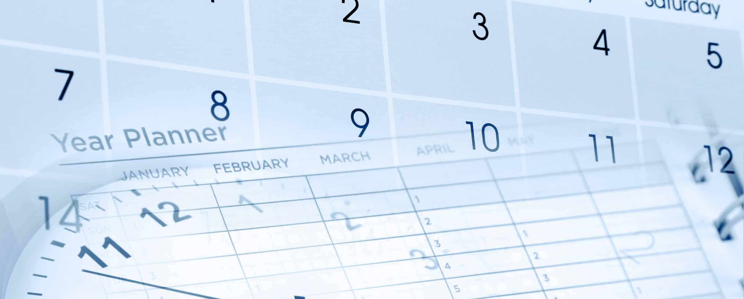 Close-up graphic showing a monthly calendar overlaid with a year planner and a clock. Dates and months are visible in soft blue tones, creating a visual representation of scheduling, planning, appointments, and time management.